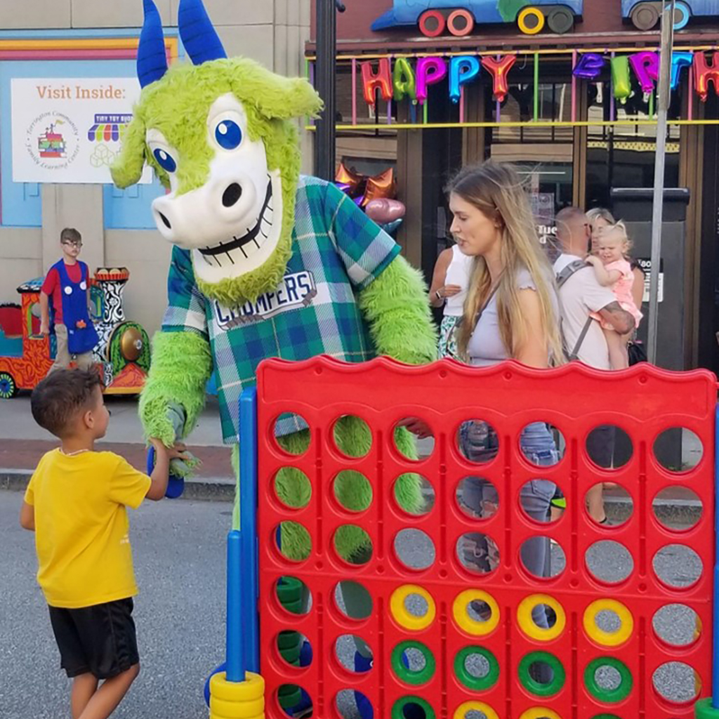 KidsPlay Birthday Green Goat at the Giant connect 4 game.